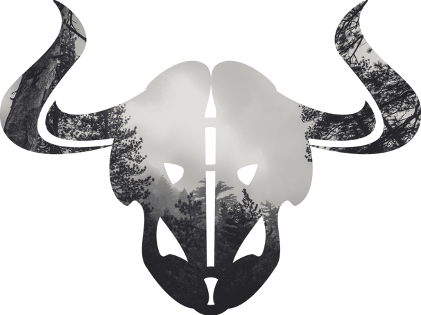 A silhouette of a monster's head, filled with trees and mist.